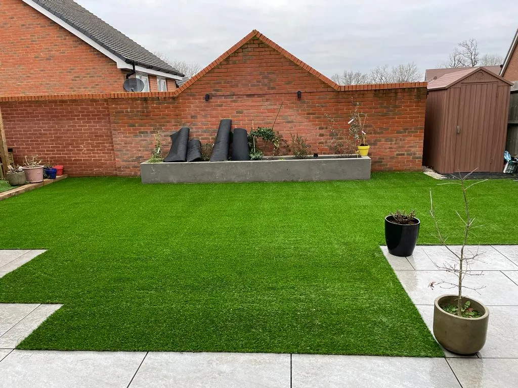 artifical grass around small patios